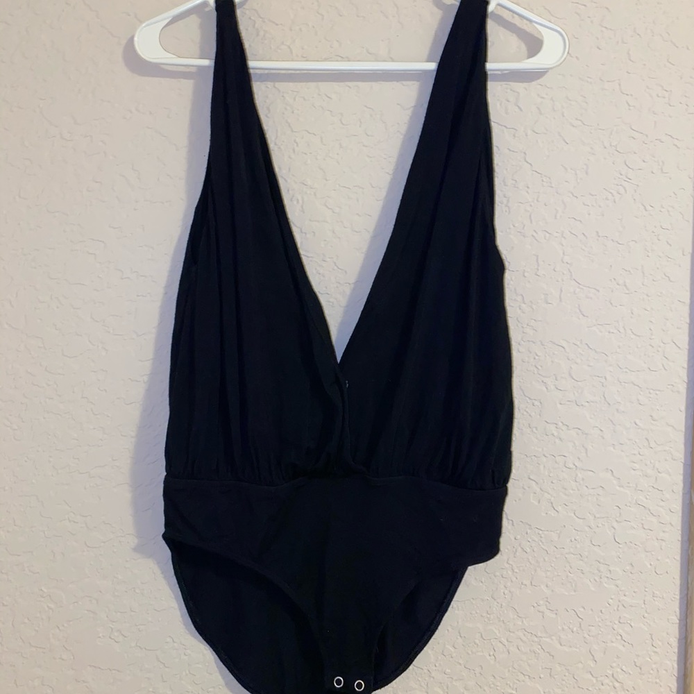 Black bodysuit with snap bottom to fit perfect